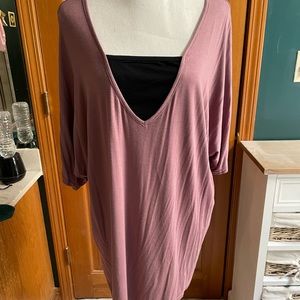 Mauve top with black insert in the V.